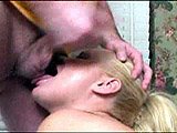 Blonde doe-eyed beauty sucking cock and licking asshole while she gets champagne poured all voer her giant titties. Nice!